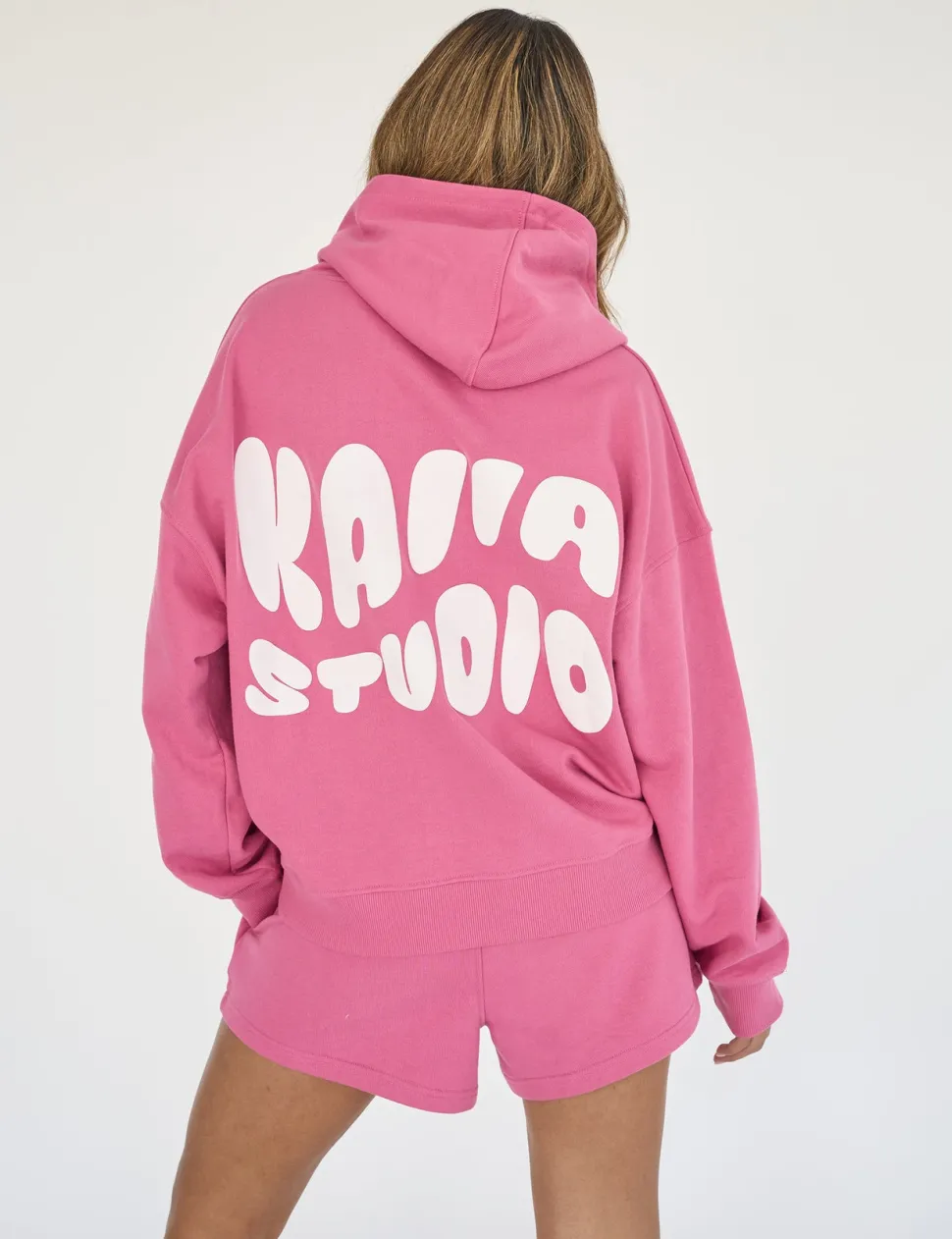 New Kaiia Studio Bubble Logo Oversized Hoodie Pink Back In Stock | Sculpt & Leisure